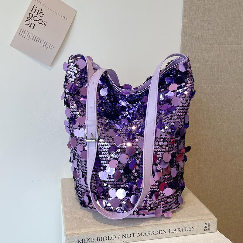 

Summer popular sequin bag 2025 new fashion women s bag large capacity shoulder messenger bag casual commuter bucket bag фіолетовий