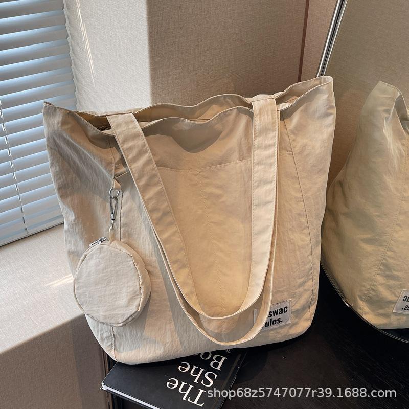 Japanese new waterproof nylon casual spring and summer shoulder bag women's design sense large-capacity commuter tote bag