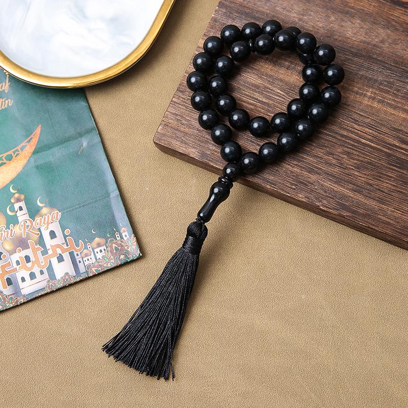 Handgefertigtes grenzüberschreitendes 33-Perlen-Quastenarmband - Gebetsperlen aus Korallimitat