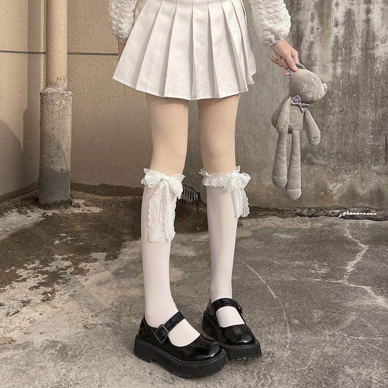 Calze da donna stile giapponese Calzini alti al ginocchio Calzini lunghi in nylon trasparente ultrasottile Calzini al ginocchio JK Lolita per ragazze dolci