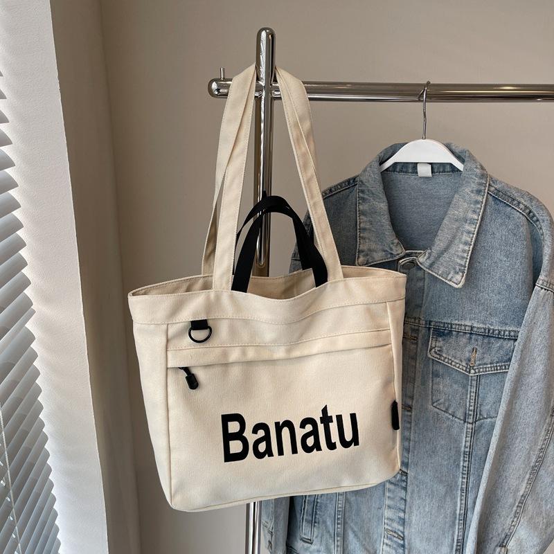 

Canvas bag women s large-capacity new autumn and winter versatile shoulder handbag class commuter tote bag