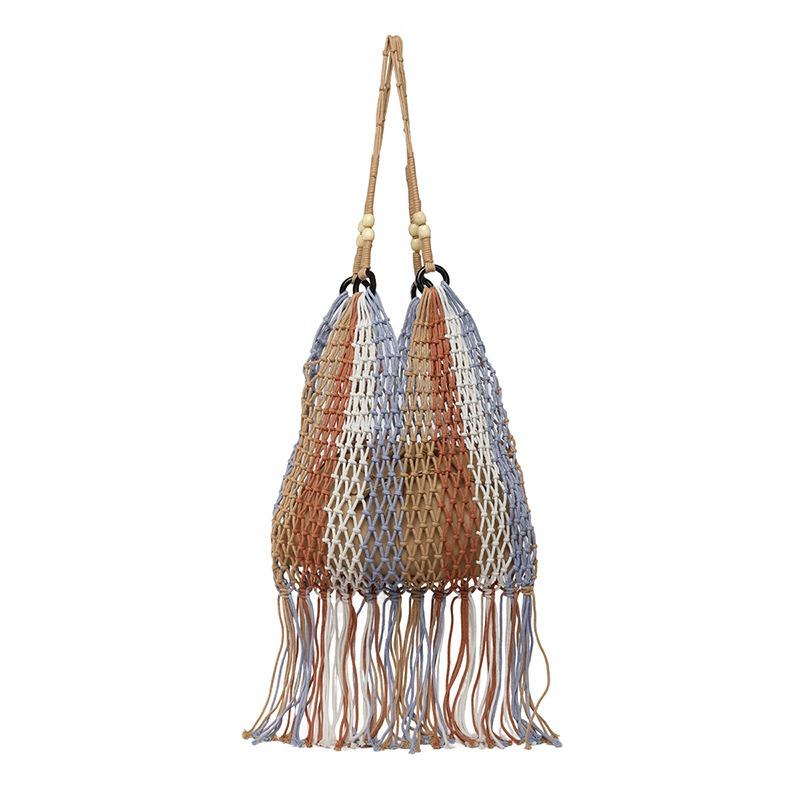 Lazy woven tassel portable shoulder hollow bag beach vacation niche leisure tote bag tide