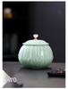 Celadon Ceramic Tea Canister: Large Half-Pound Capacity Storage for Green or Black Tea - Porcelain Sealing Jar with Printed Design.