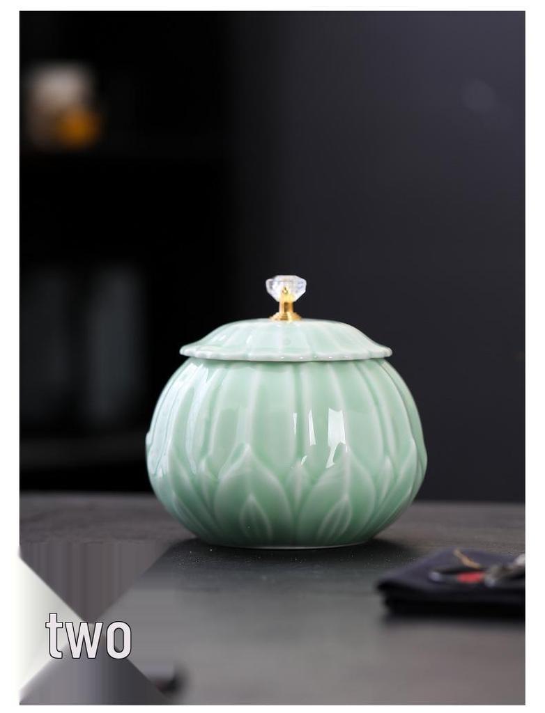 Celadon Ceramic Tea Canister: Large Half-Pound Capacity Storage for Green or Black Tea - Porcelain Sealing Jar with Printed Design.