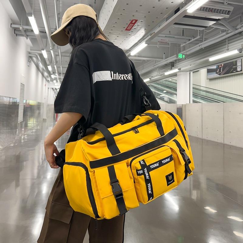 Travel bag large capacity high sense high value fitness bag dry and wet separation light backpack men's messenger bag