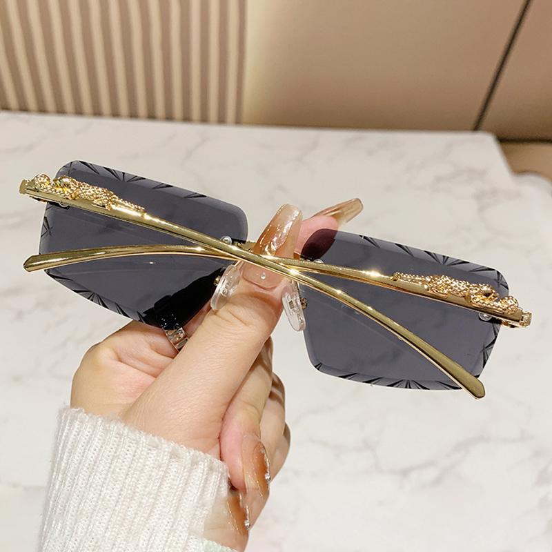 Rimless Punk Vintage Sunglasses Women Men Luxury Brand Designer UV400 Metal Leopard Head Hip Hop Shades