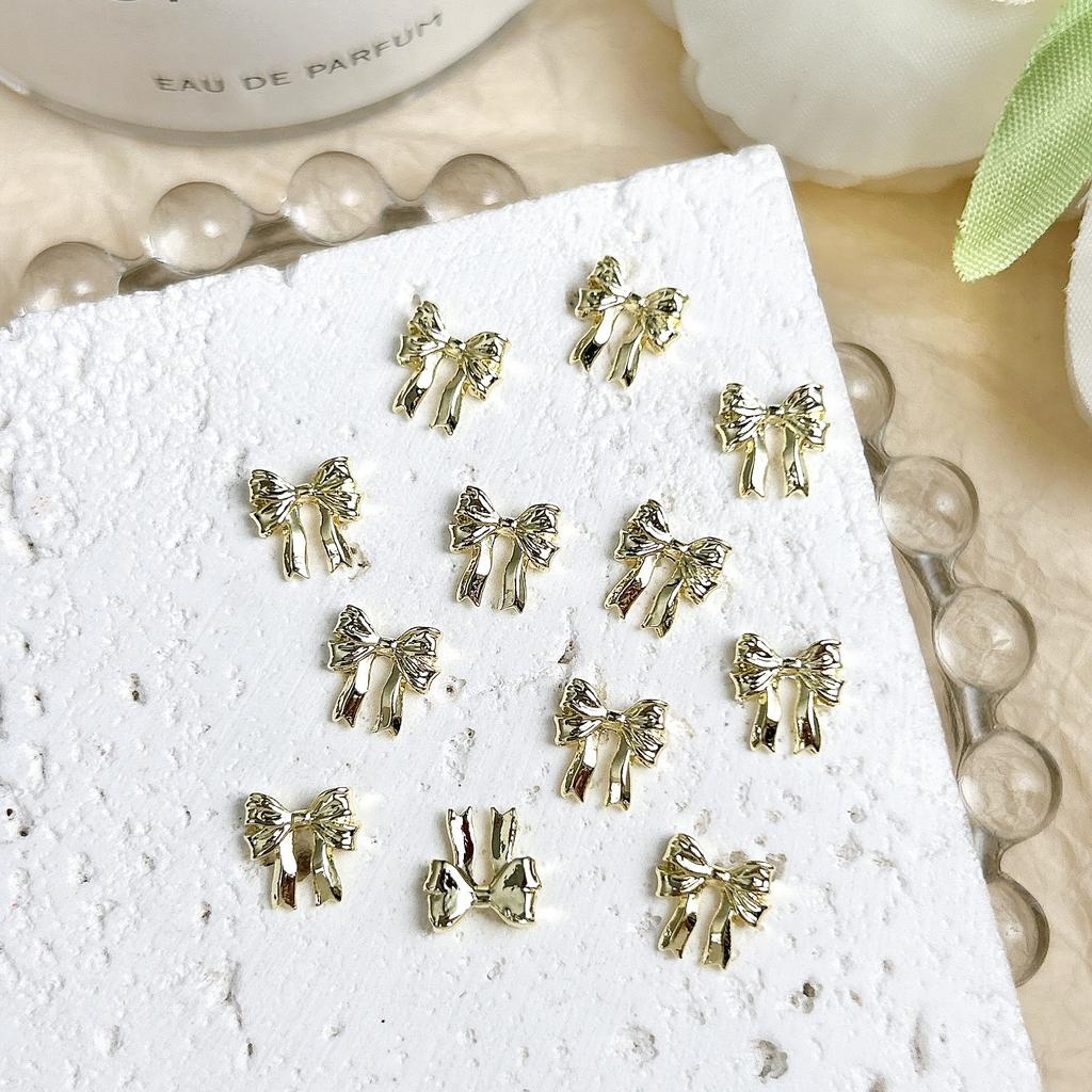 Acessórios para Nail Art Liga Mini Laço Fita Dourada Liga K Branca Decoração de Unha Simples Gravata Borboleta 3D