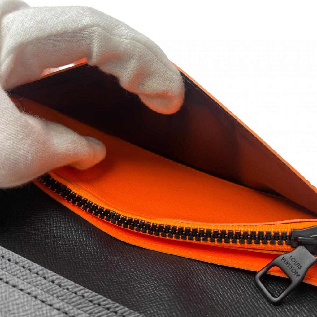 Używany portfel LOUIS VUITTON Seria Brązowo/Pomarańczowa PVC męski