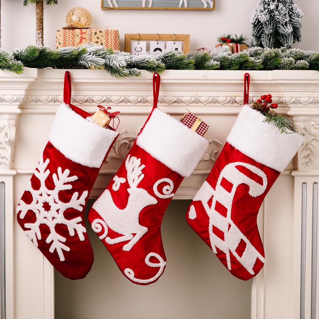 Christmas Beautifully Crafted Stockings With Soft Fabric And Playful Reindeer And Snowflake Themes
