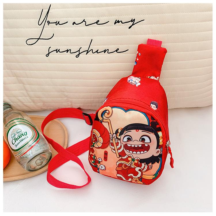 

Школьный рюкзак новая детская нагрудная сумка мультяшная сумка для мелочи Нечжа мальчики и девочки любят иностранные аксессуары одноплечный рюкзак через плечо