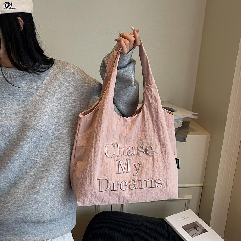 

ins Lazy Wind Letter Embroidered Canvas Bag Women s 2025 New Fashion Lightweight Shopping Bag Commuter Tote Bag 34*10*34 розовый
