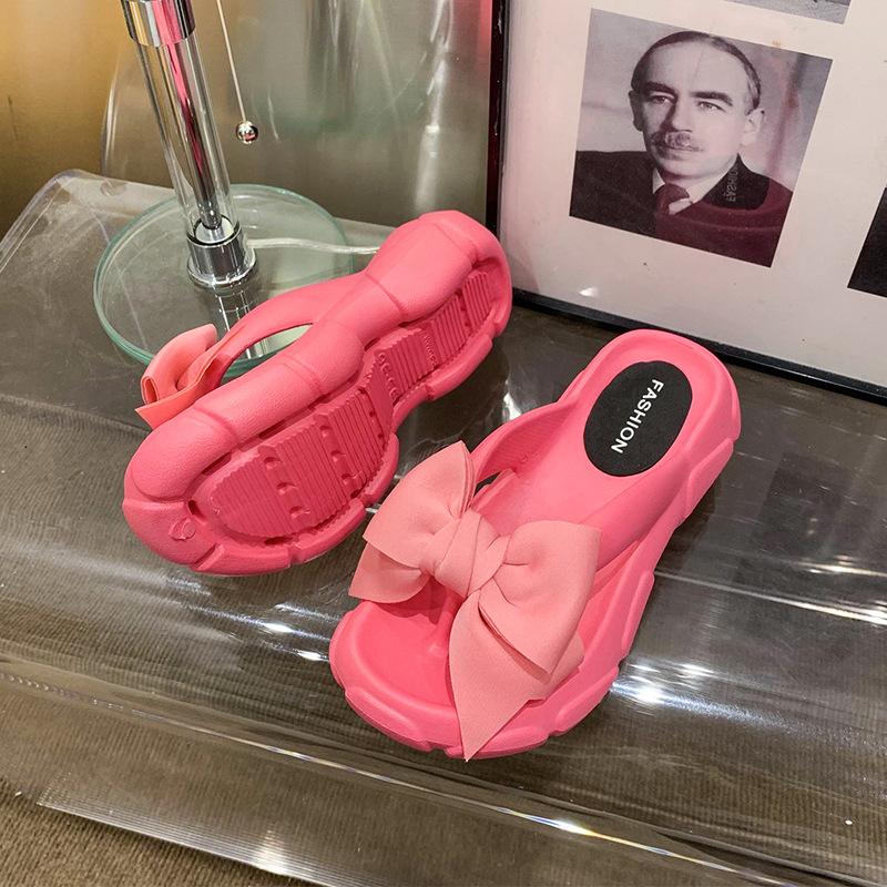 Niche high-end sense pinch foot cool slippers women's new bow thick-soled flip-flops