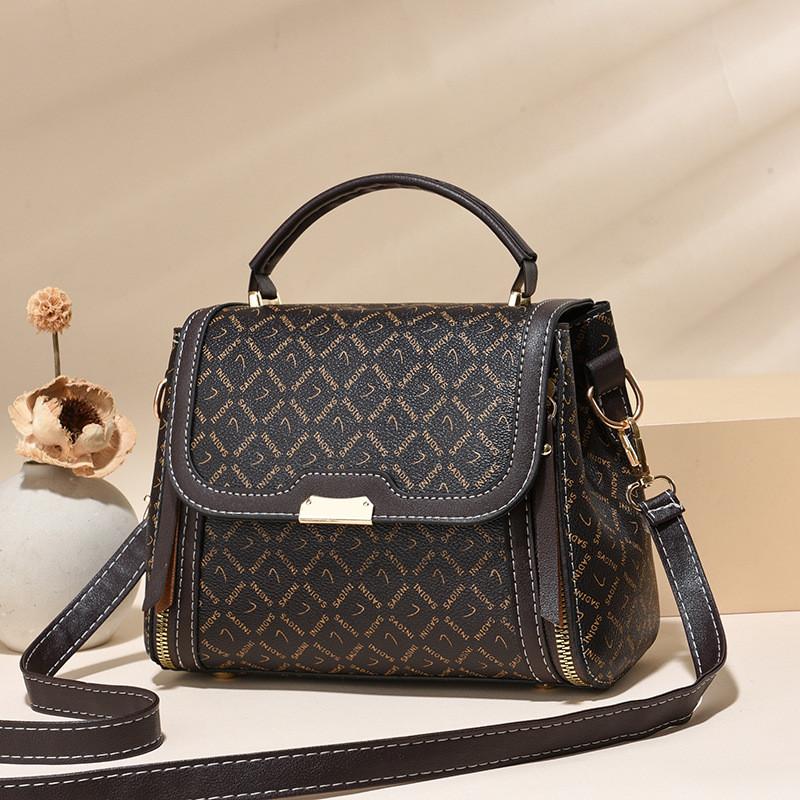 

Stylish And Practical Black Pu Handbag Ideal For Everyday Use With Versatile Design Coffee Check