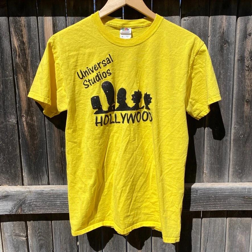 

Universal Studio Hollywood Simpson family glitter graphic yellow t-shirt Adult M L
