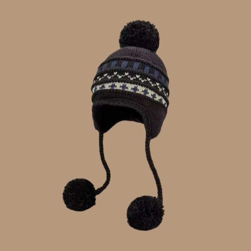 Autumn and winter lace-up ear protectors knitted hat women's Fair Island wind bag head hairball hat thickened warm jacquard wool hat