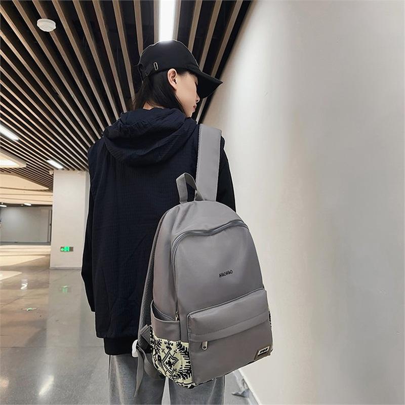 Schultasche Freizeitrucksack Damen Nylon bedruckt Studenten Schultasche Einfacher Rucksack Großhandel Mittelschüler Schultasche Rucksack Herren