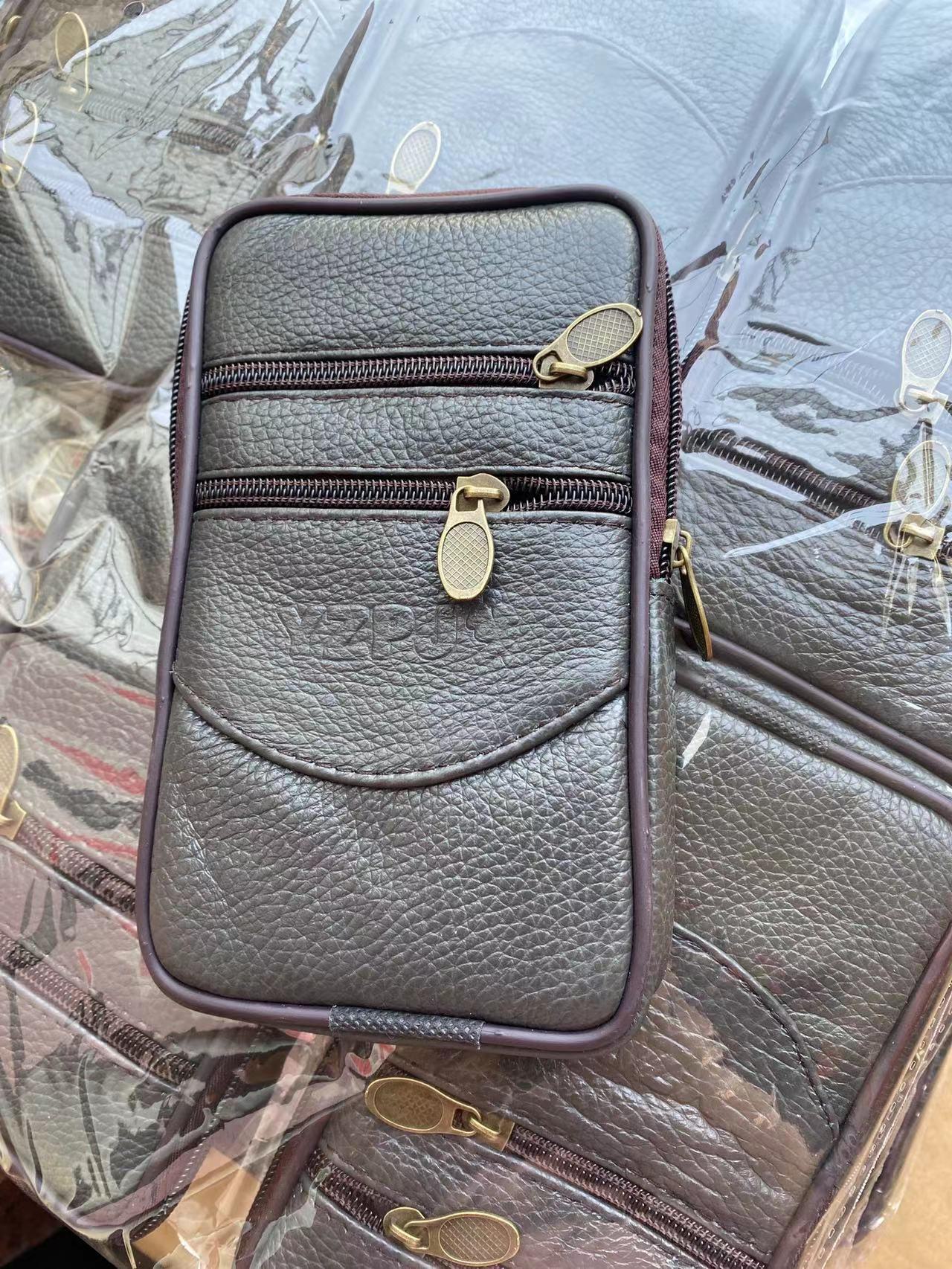 

Чоловіча багатофункціональна поясна сумка для мобільного телефону з волової шкіри для 6,3-дюймових пристроїв three-pull vertical bag thin 19 cm