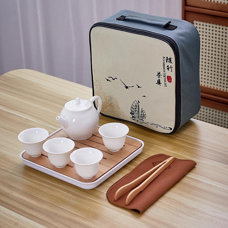 Dehua white porcelain tea set, practical ceramic cover bowl, one pot, four cups, outdoor storage, travel convenience bag, business small gifts