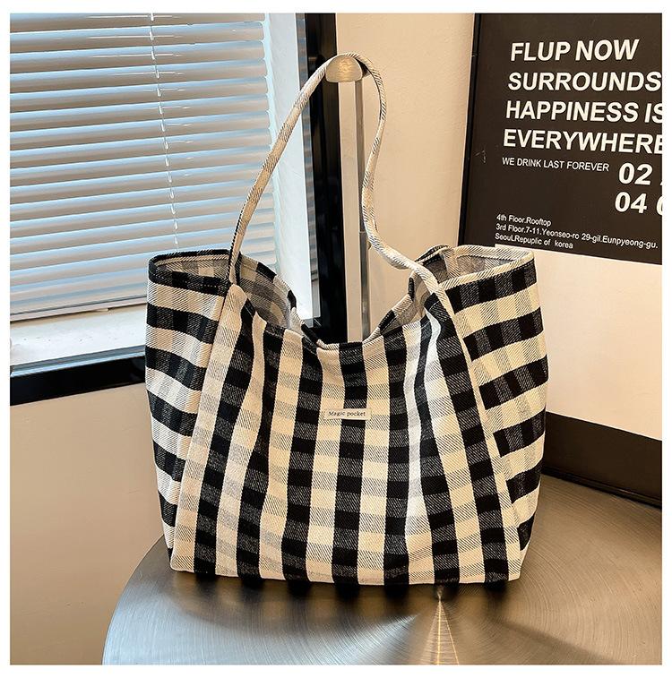 

Large capacity canvas bag women s 2025 new niche ins work commuter tote bag Korean casual shoulder bag чорний