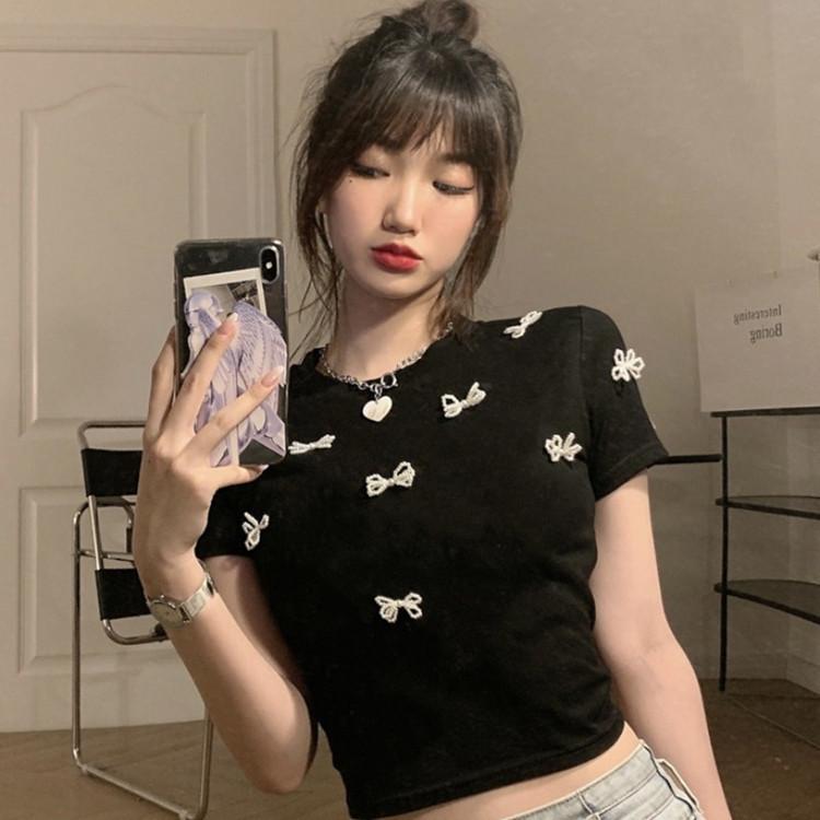 Vår och sommar Ny rosettpärla Hög midja Navel Kort topp Designkänsla Nisch Kortärmad T-shirt