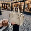 Trendy Women's Off-White Silver Bucket Shoulder & Crossbody Bag 2025