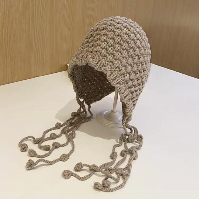 

Осень и зима новая плюшевая сумка для защиты ушей головная шляпа женская теплая универсальная шерстяная вязаная шапка смешанного цвета на шнурке 25 * 25 + 38 braided tassel