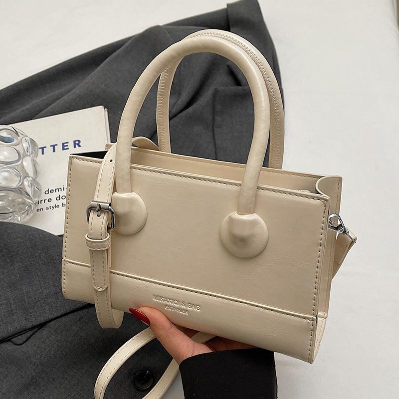 Wholesale Popular Niche Simple Temperament High Sense Portable Small Square Bag Women's Fashion Versatile Work Commuter Messenger Bag