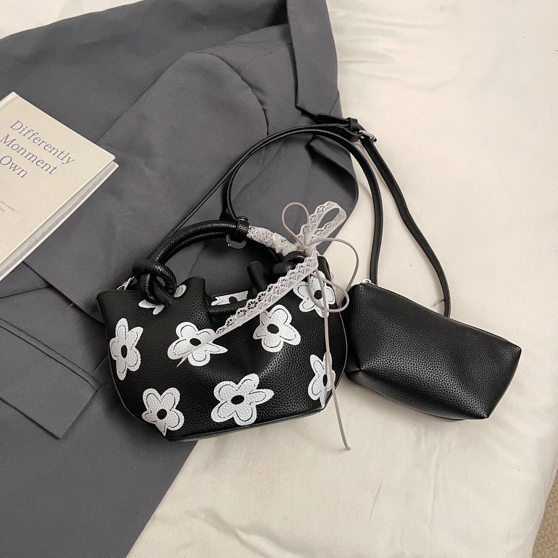 

Spring and summer bags women s niche design sense shoulder bag women s portable small bag high-end oblique span bag No pendant чорний