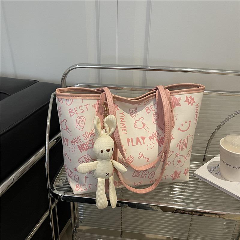 Printed fashion commuting large capacity new personalized pendant autumn popular casual shoulder tote bag