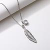 Vintage Feather Pendant Necklace with Sparkling Round Stone Accent Elegant Nature Inspired Jewelry for Women