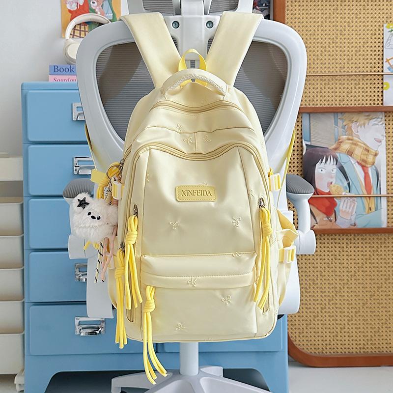 Schoolbag custom cute bow backpack student tutoring bag lightweight 1-1 grade three-piece backpack burden reduction