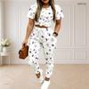 Women Plus Size White Printed Round Neck Short Sleeve Top Drawstring Cuffed Pants Two Piece Set With Pockets