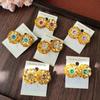 Yunnan Dai Ethnic Gold Earrings with Floral Pattern and Diamond Insets