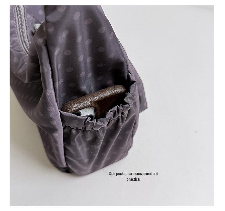 Korean Style Artistic Polka Dot Drawstring Pleated One-Shoulder Crossbody Bag for Women - Large Capacity, Portable, and Perfect for Commutes.
