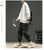 Men's American Trendy Multi-Pocket Loose Cargo Joggers - Military Green Parachute Pants, Casual Retro Style for Autumn.