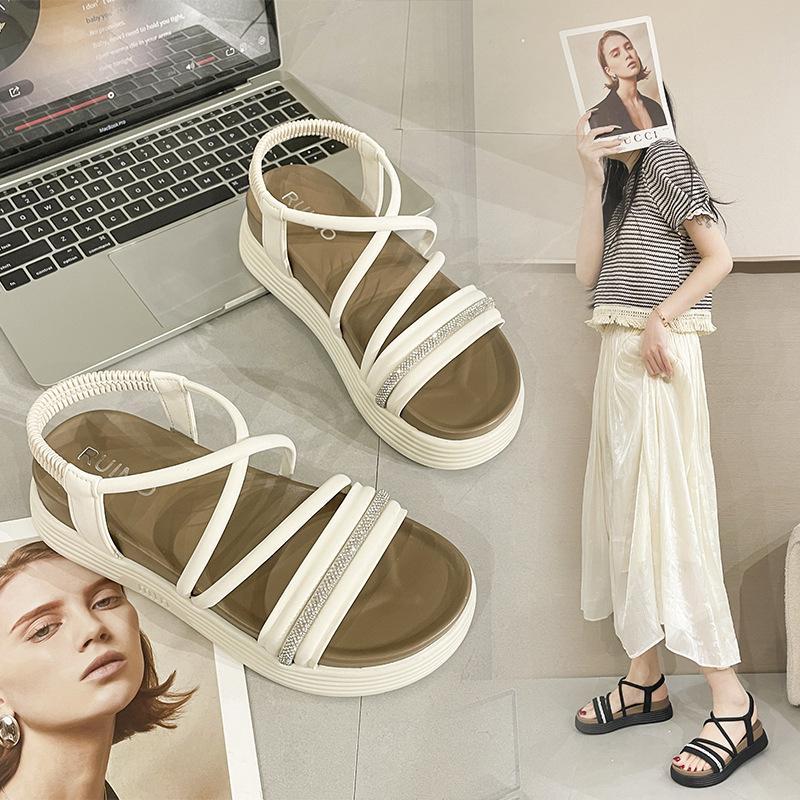2025 spring and summer new sandals women's platform stepping on shit feeling cross with open-toed beach sandals with skirts Roman sandals