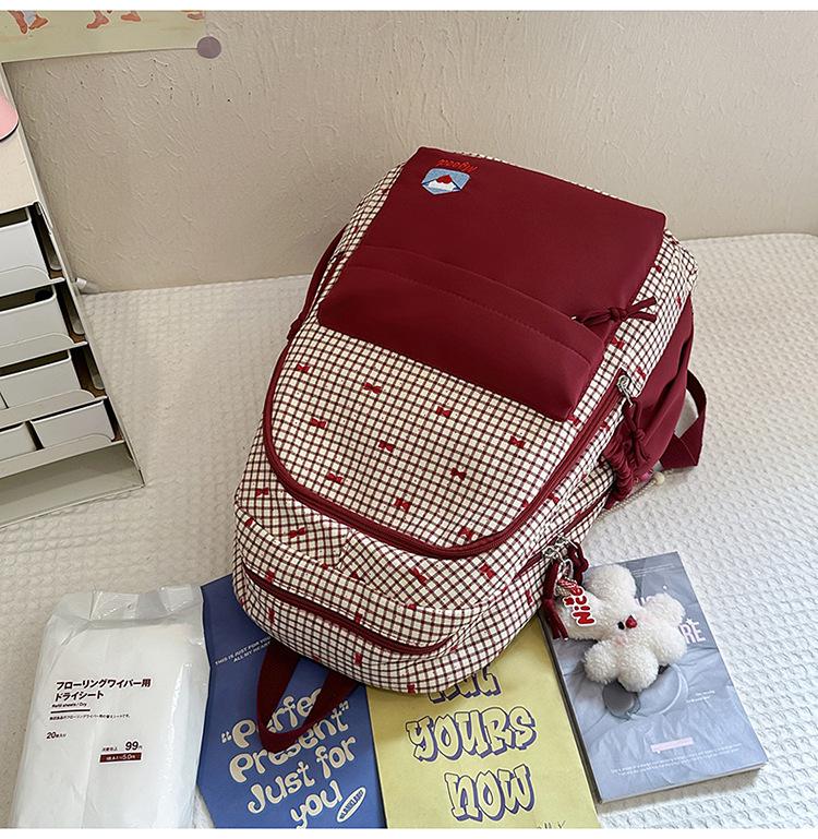 Słodki plecak w stylu japońskim z kokardą: Lekka, wodoodporna torba na ramię dla uczniów szkół średnich i ponadgimnazjalnych.