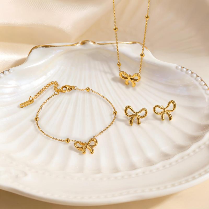 3Pcs Stainless Steel Delicate Golden Colour Fashion Bow Neckle Bracelet Earrings Titanium Jewelry Set Bow Pendant Accessory