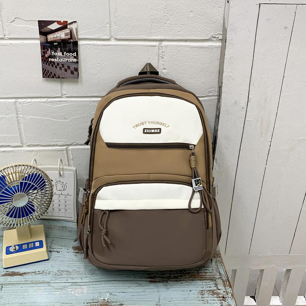 Schoolbag trendy cool new contrasting color backpack Korean version Mori large capacity high value backpack junior high school student schoolbag