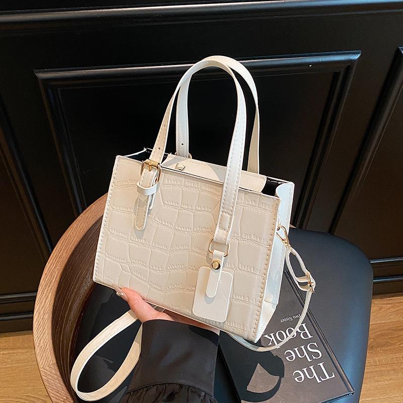Leather niche temperament bag women's 2025 new light luxury messenger bag high-end portable tote bag