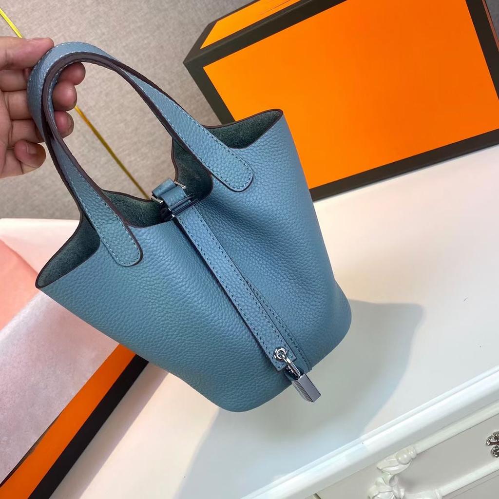 Hochwertige halbhandgefertigte Gemüsekorbtasche togo erste Schicht Rindsleder Pendlertasche echtes Leder tragbare Beuteltasche Damen 18cm