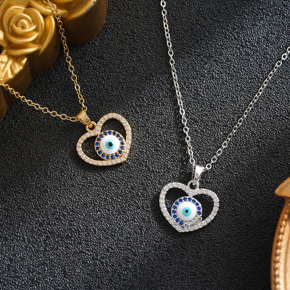 European and American Women's Heart-Shaped Devil's Eye Pendant Necklace - Versatile Retro Copper Jewelry