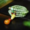 Damen Südliches Rot Mehrfachwickel 108-Perlen-Armband mit Hetian-Jade & Bernstein - Ethno-Schmuck für Männer & Frauen.