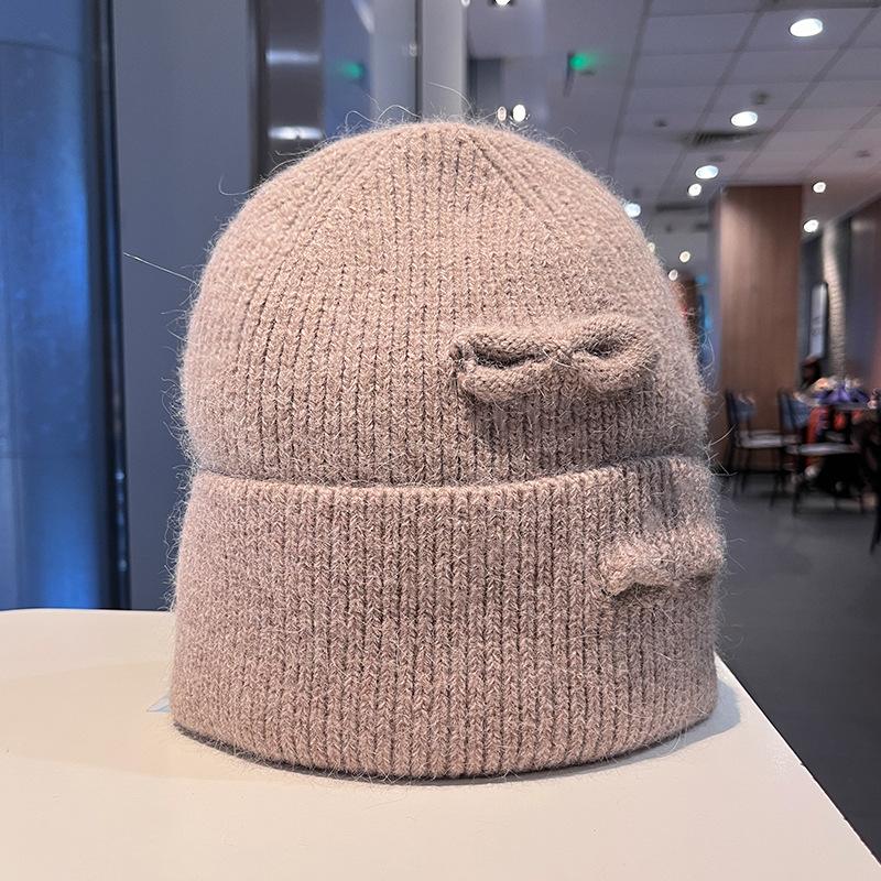 Korean version of fashion hole knitted wool hat men and women autumn and winter outdoor warm bag head cold hat lazy knitted hat