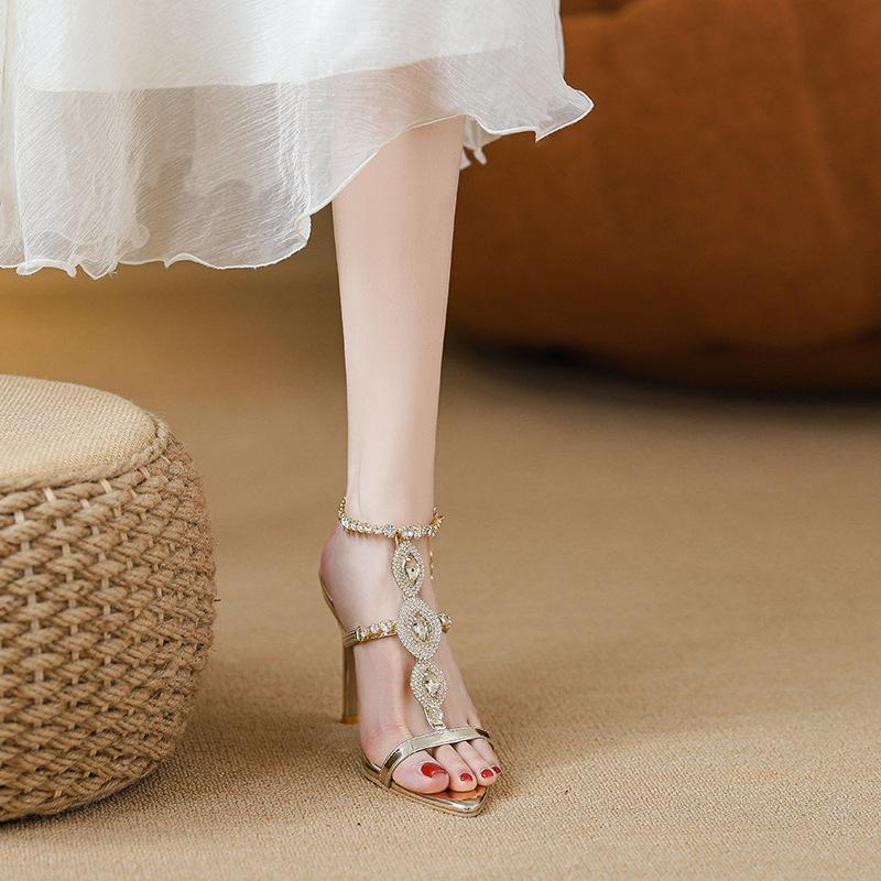 Gold crystal high heels women's 2025 new summer thin heel pointed beautiful chain word with rhinestone sandals