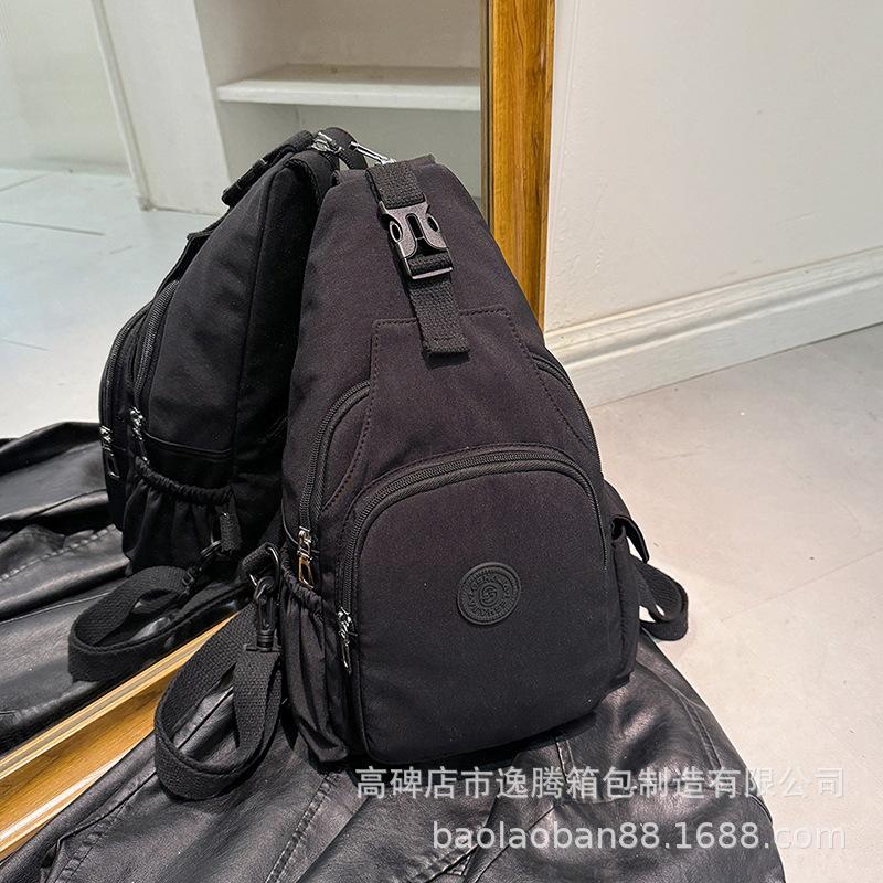 

2024 осень новые модели могут быть одно плечо кроссбоди нагрудная сумка может быть двух плечо большой емкости модный тренд уличный женский мешок чёрный