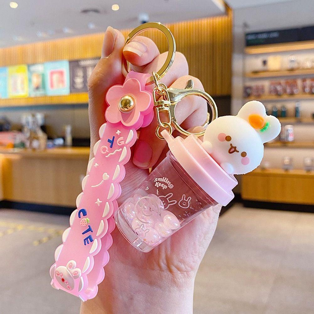 

Бутылка с зыбучим песком, плавающий кролик, подарок девушке, брелок для ключей, сумка, подвеска, автомобильный аксессуар розовый