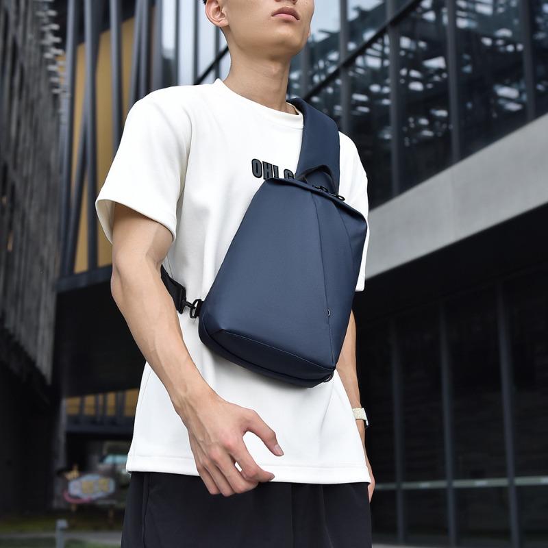 Large-capacity wear-resistant waterproof breast bag, new men's business parcel, multi-functional messenger bag.
