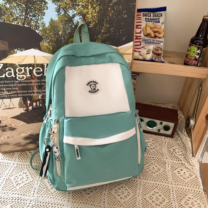 New schoolbag female high school student backpack junior high school student large capacity student third to sixth grade schoolbag