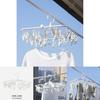 Portable White Plastic Clothes Hanger With 24 Clips For Efficient Drying